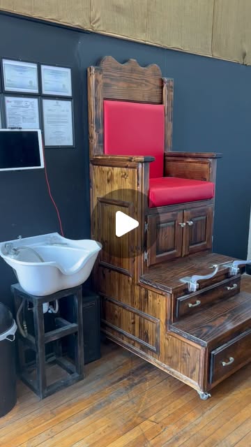 Classic wooden barber chair inside the shop